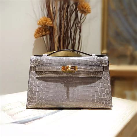 hermes kelly pochette vs mini kelly|mini kelly pochette.